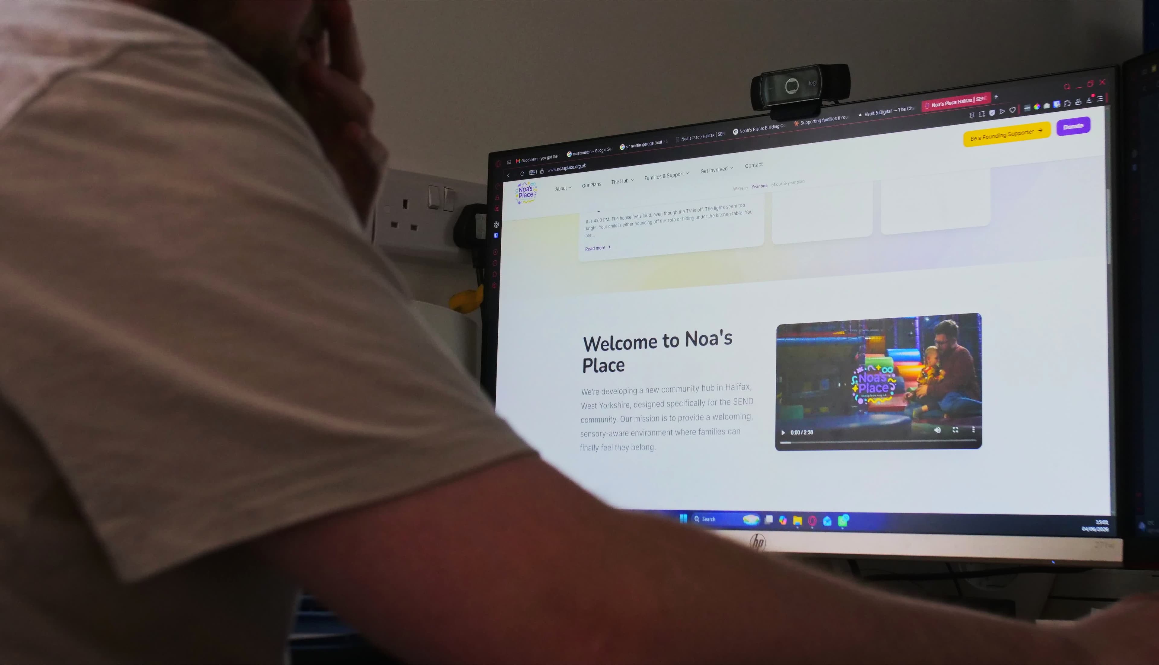 Josh reviewing a live charity website at Vault 5 Digital