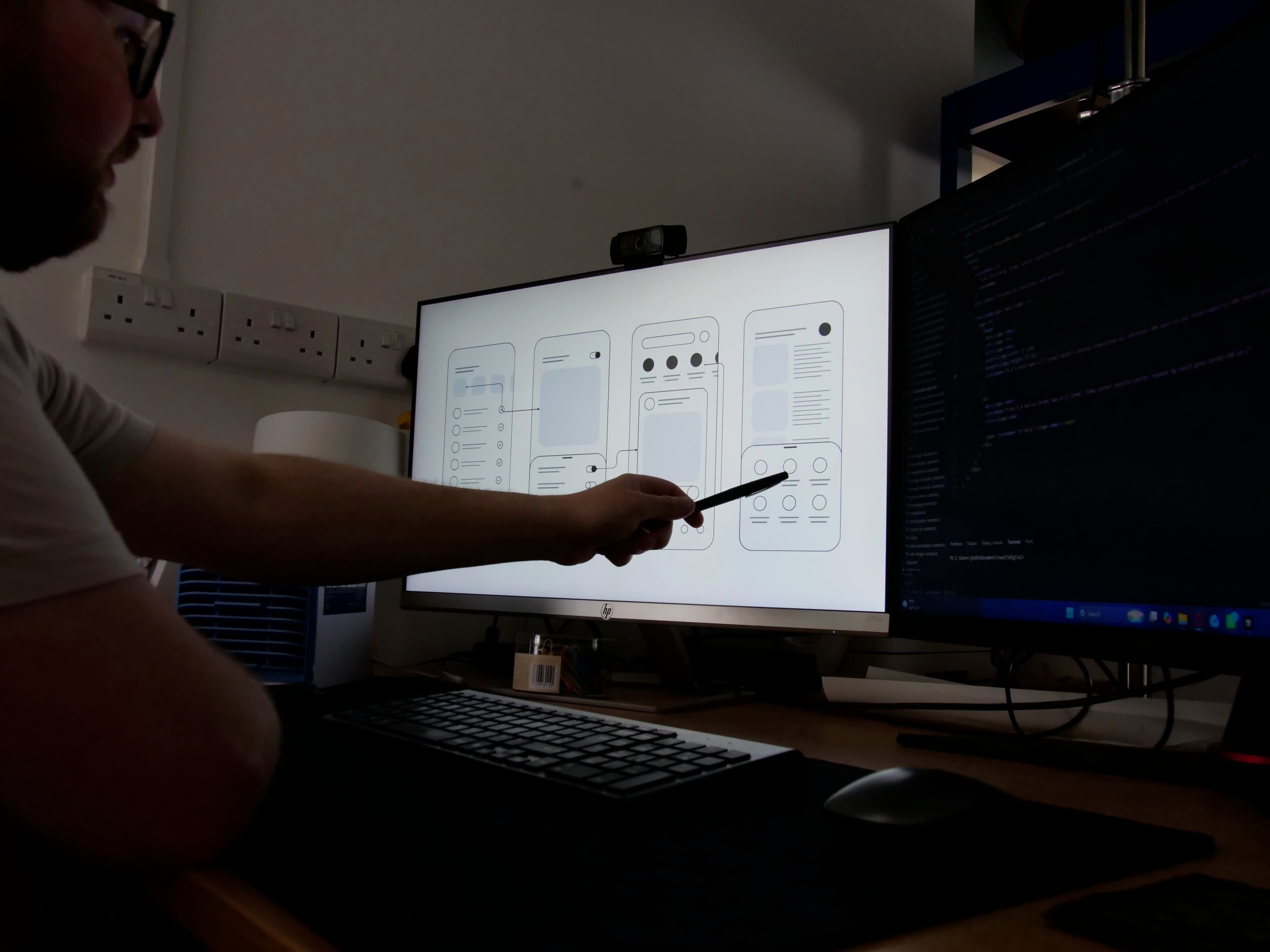 Josh planning a charity website wireframe at Vault 5 Digital