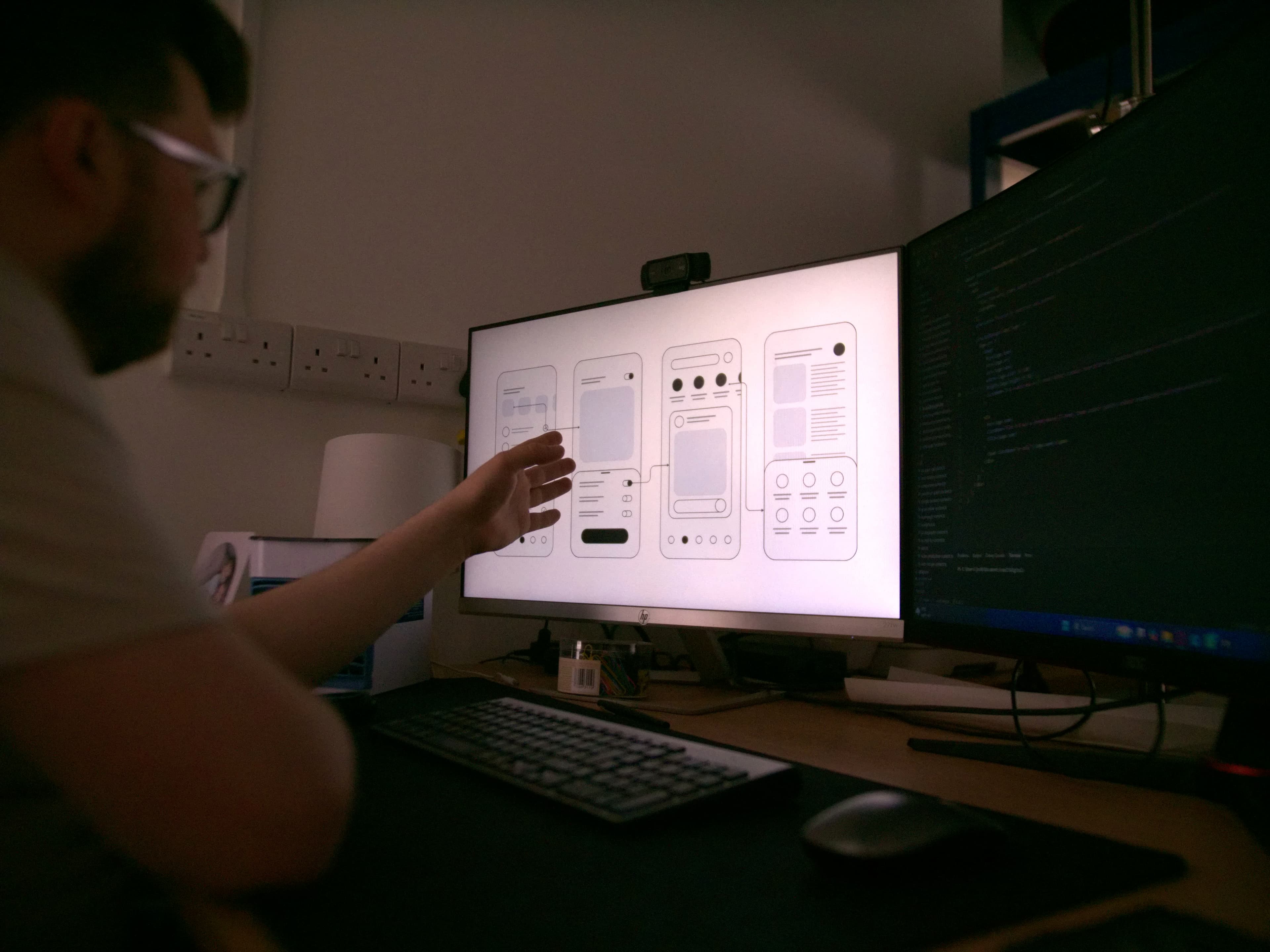 Josh wireframing a custom charity website creation project
