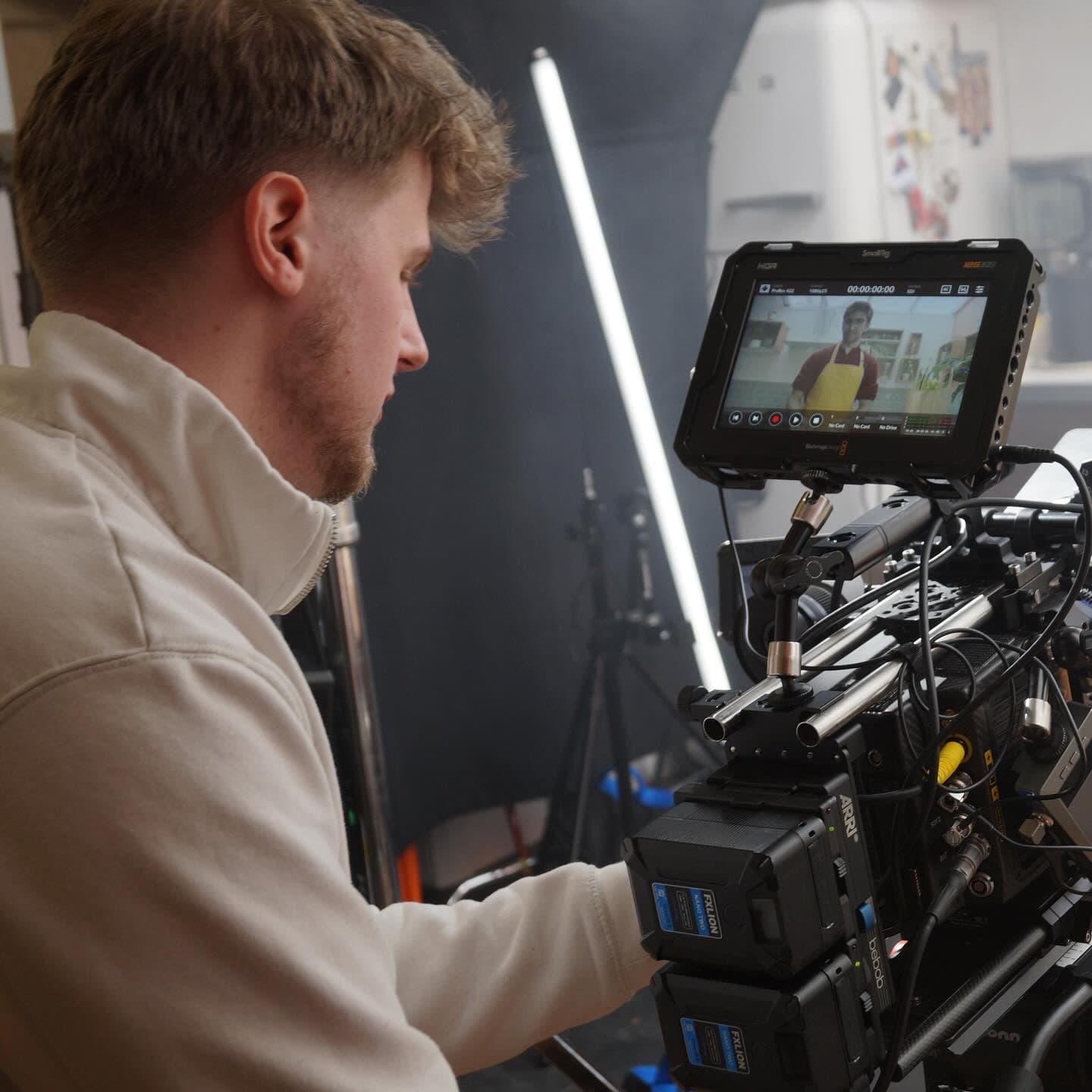 Josiah on set filming a charity campaign film